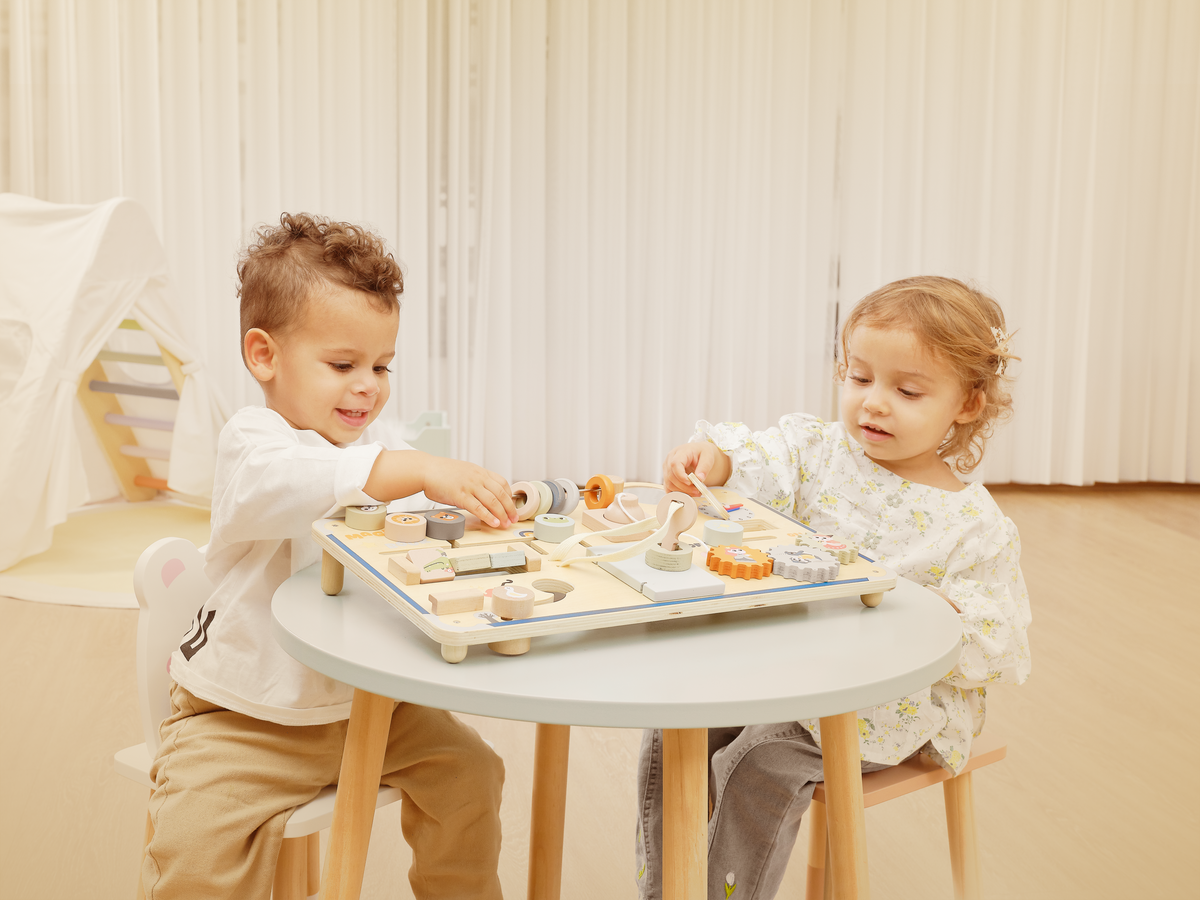 Child hands playing with wooden toy close-up detail